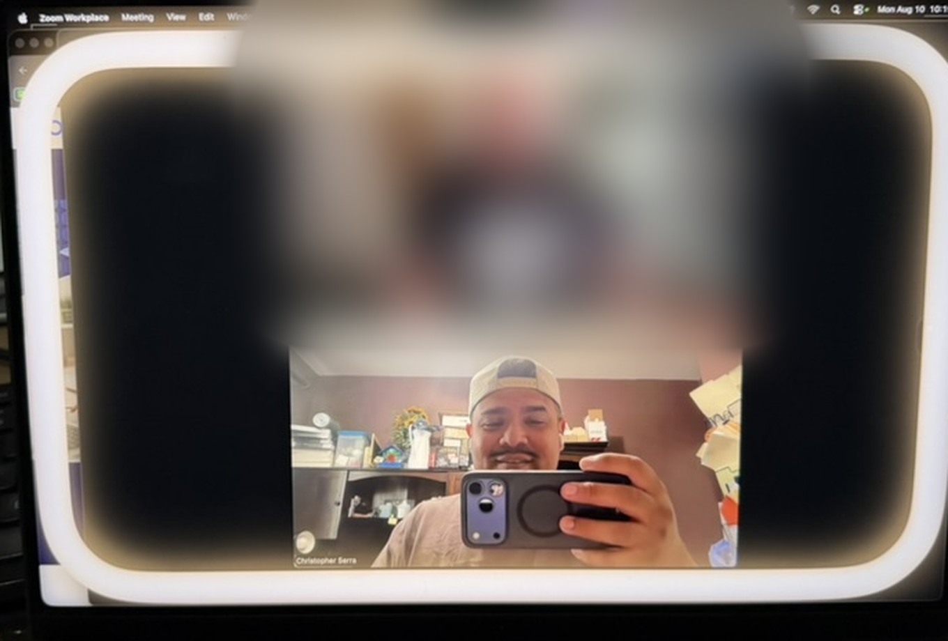 Chris Serra on a video call with a chiropractic client, working through their marketing.